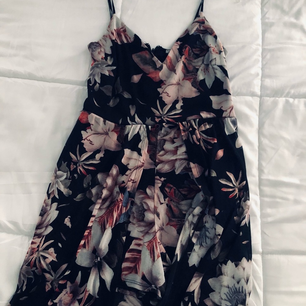 I’m selling a short Romper with a Long Cape skirt